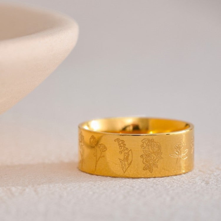 Elegante anillo con decoración floral